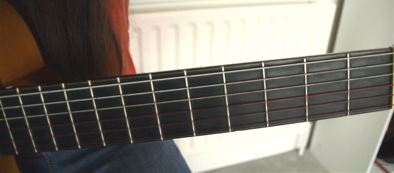 Rusty strings on a nylon string guitar