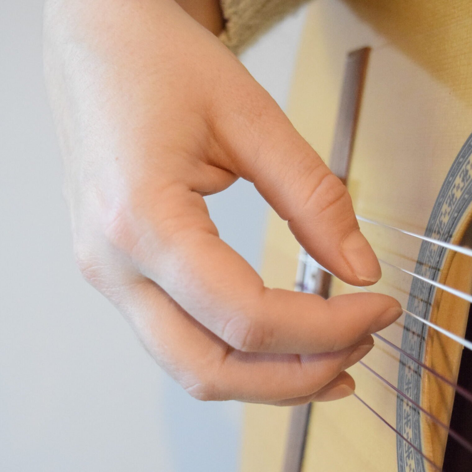Classical guitar right-hand arpeggio technique