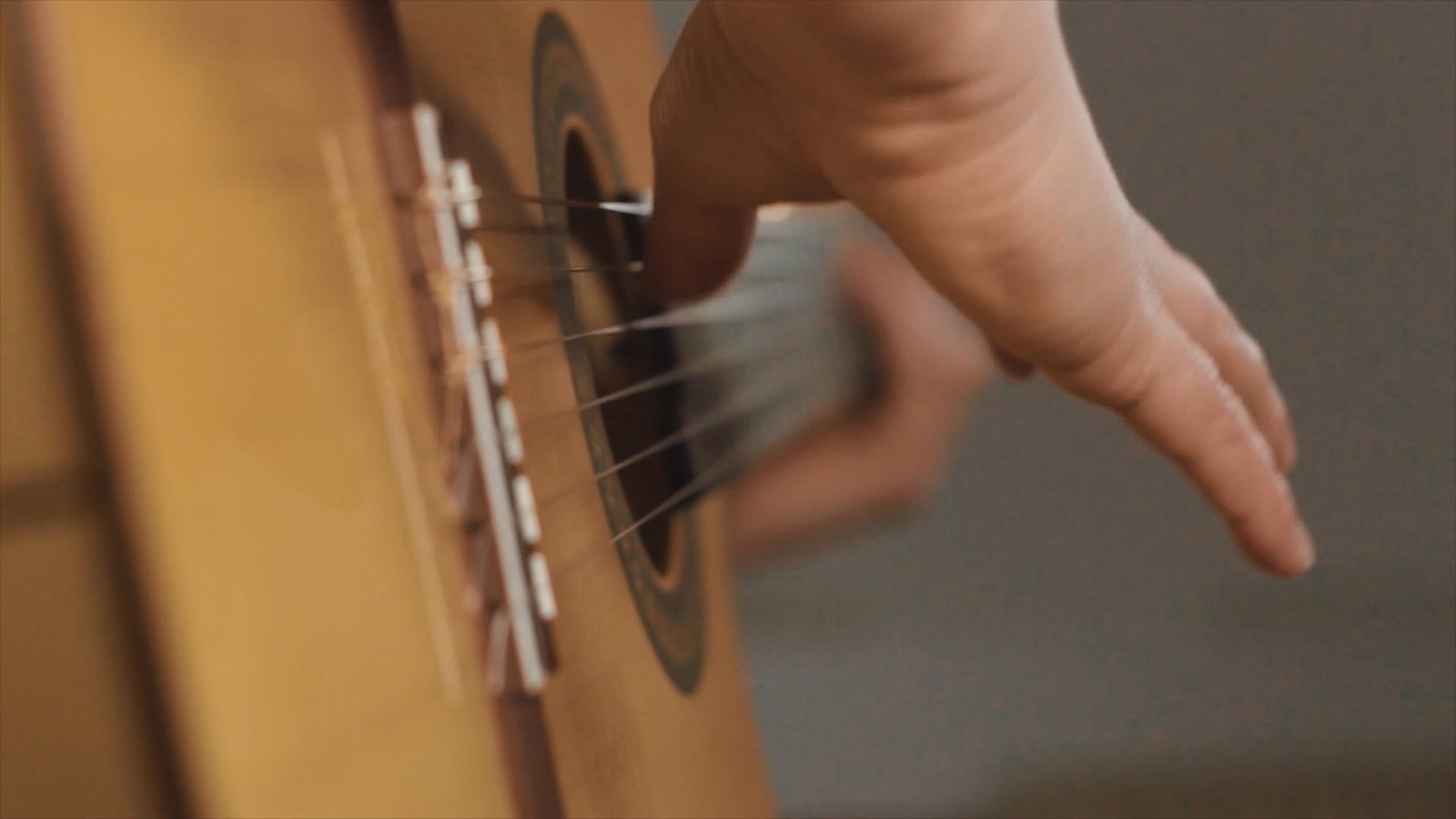 Rumba strumming technique demonstrated on Spanish guitar